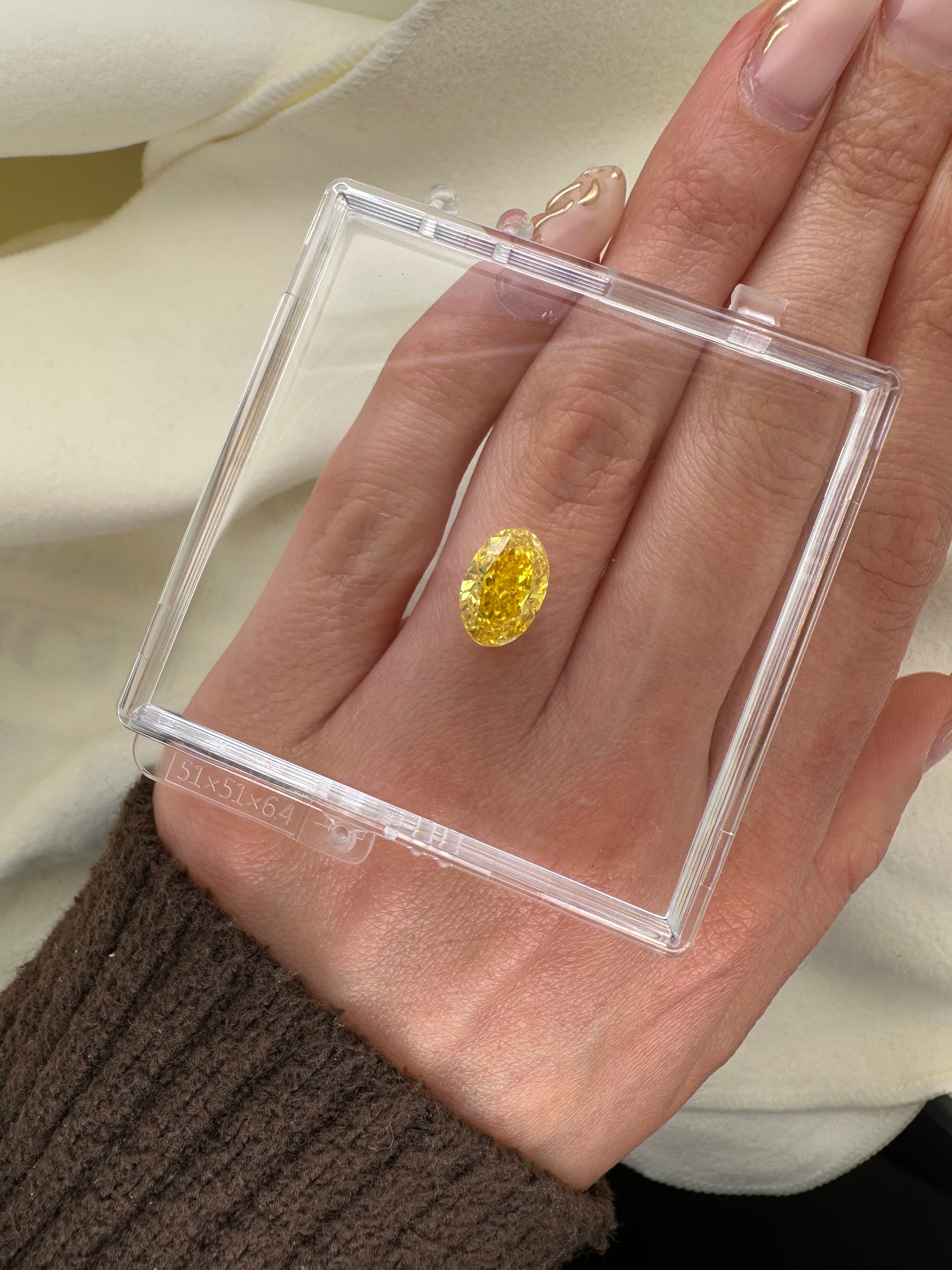 3.10 CARAT OVAL YELLOW LAB DIAMOND