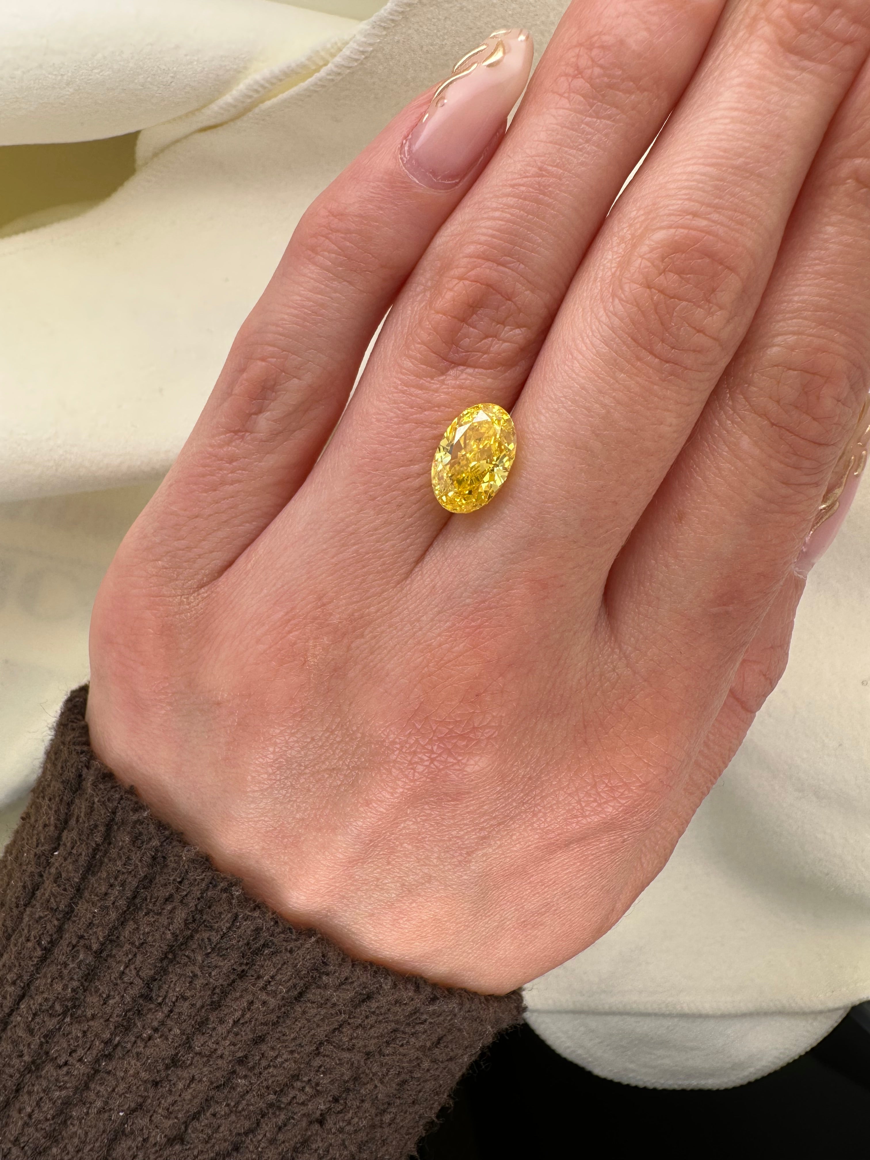3.10 CARAT OVAL YELLOW LAB DIAMOND