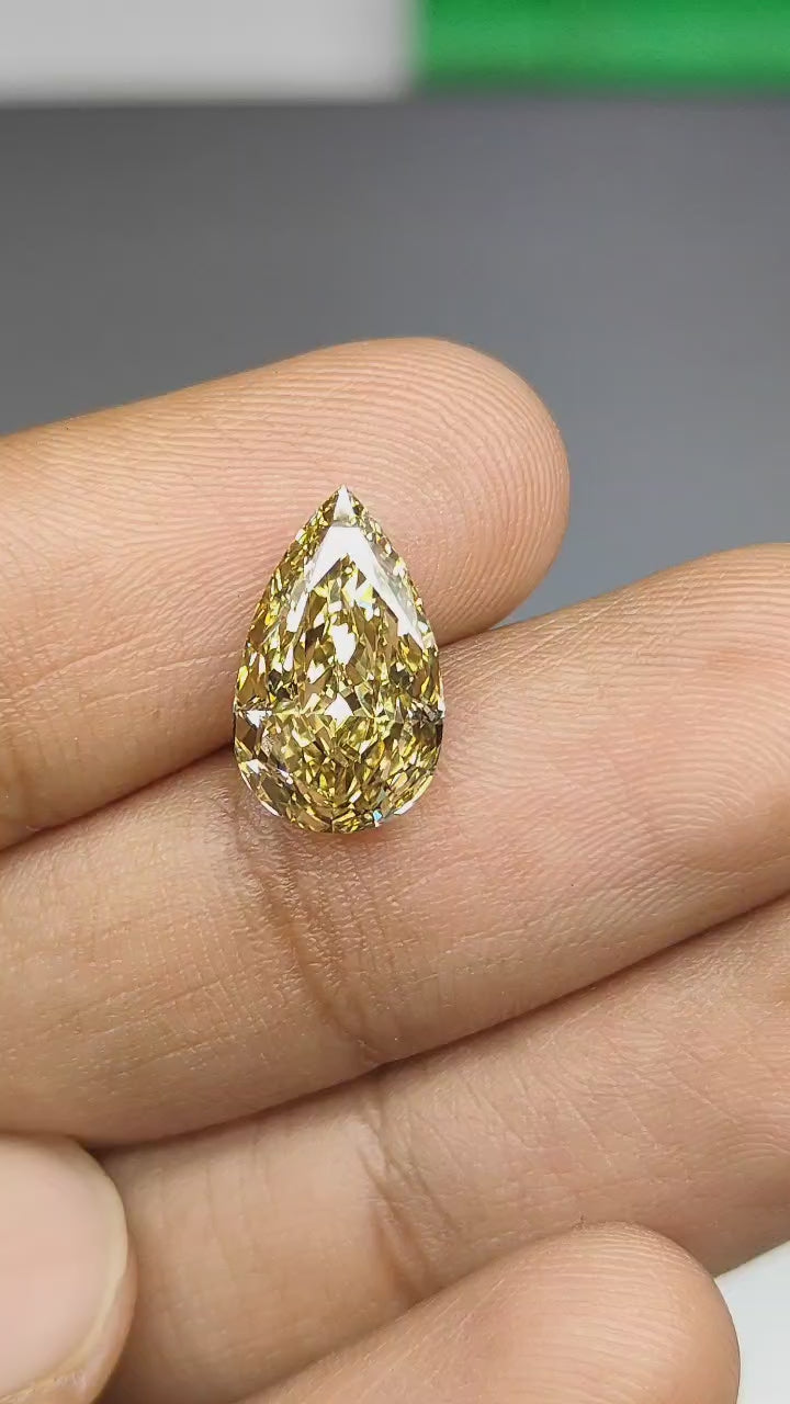 Load video: 4.55 CARAT YELLOW PEAR LAB DIAMOND