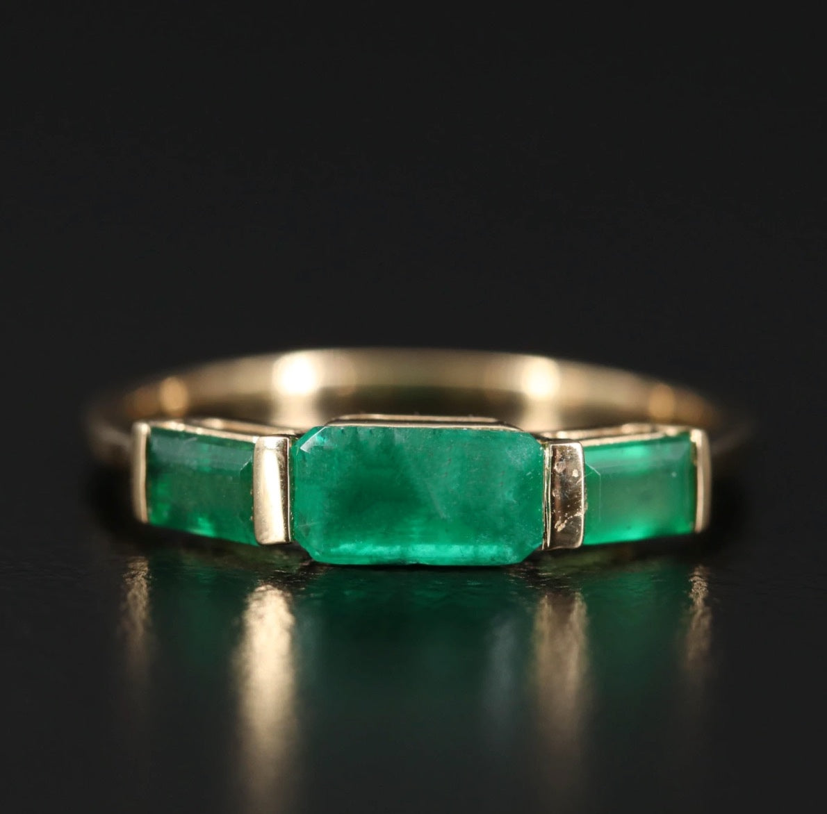 THREE STONE EMERALD RING