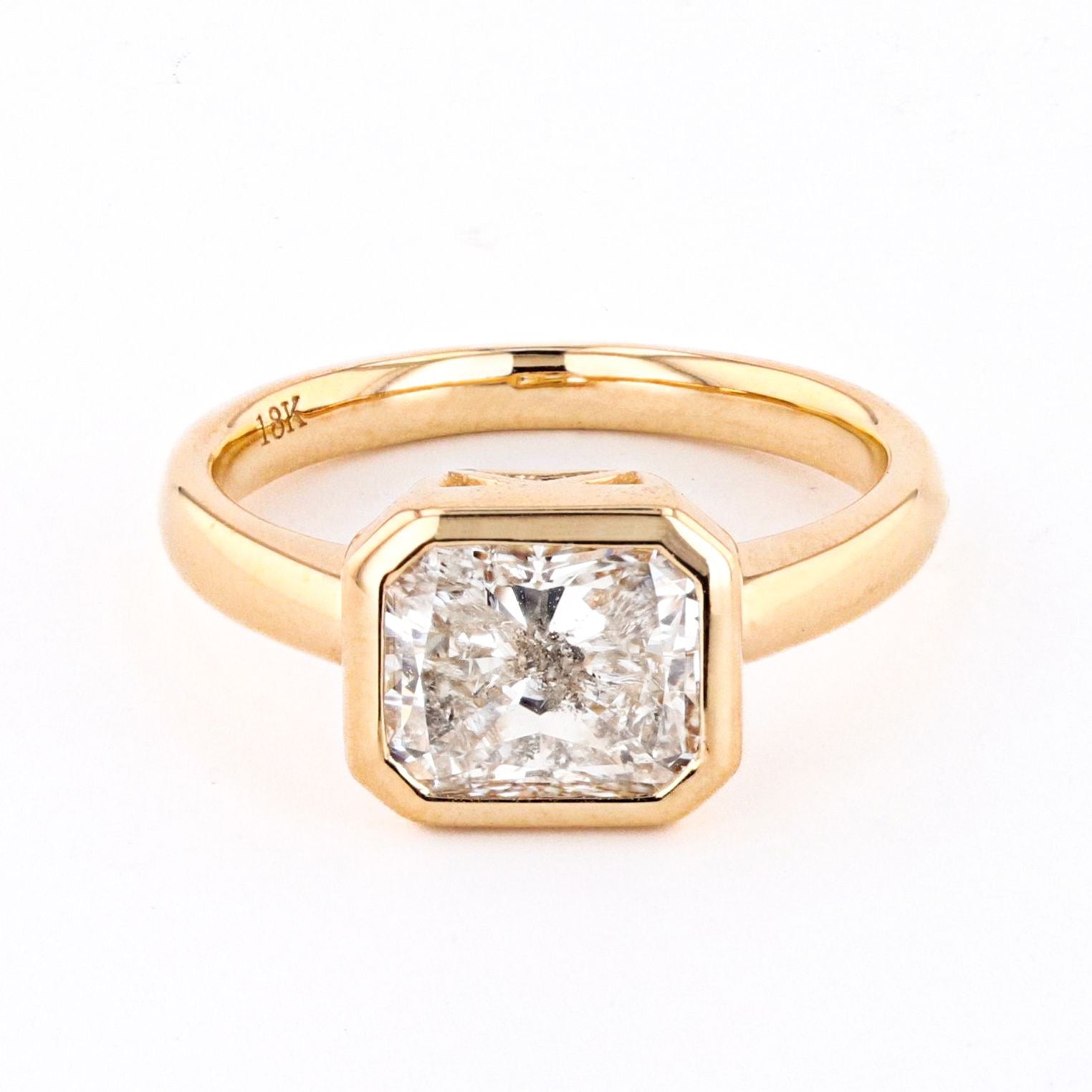 2.29 CARAT EAST-WEST BEZEL SET RADIANT CUT DIAMOND