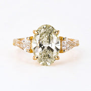 3.23 CARAT CHAMPAGNE OVAL THREE STONE RING