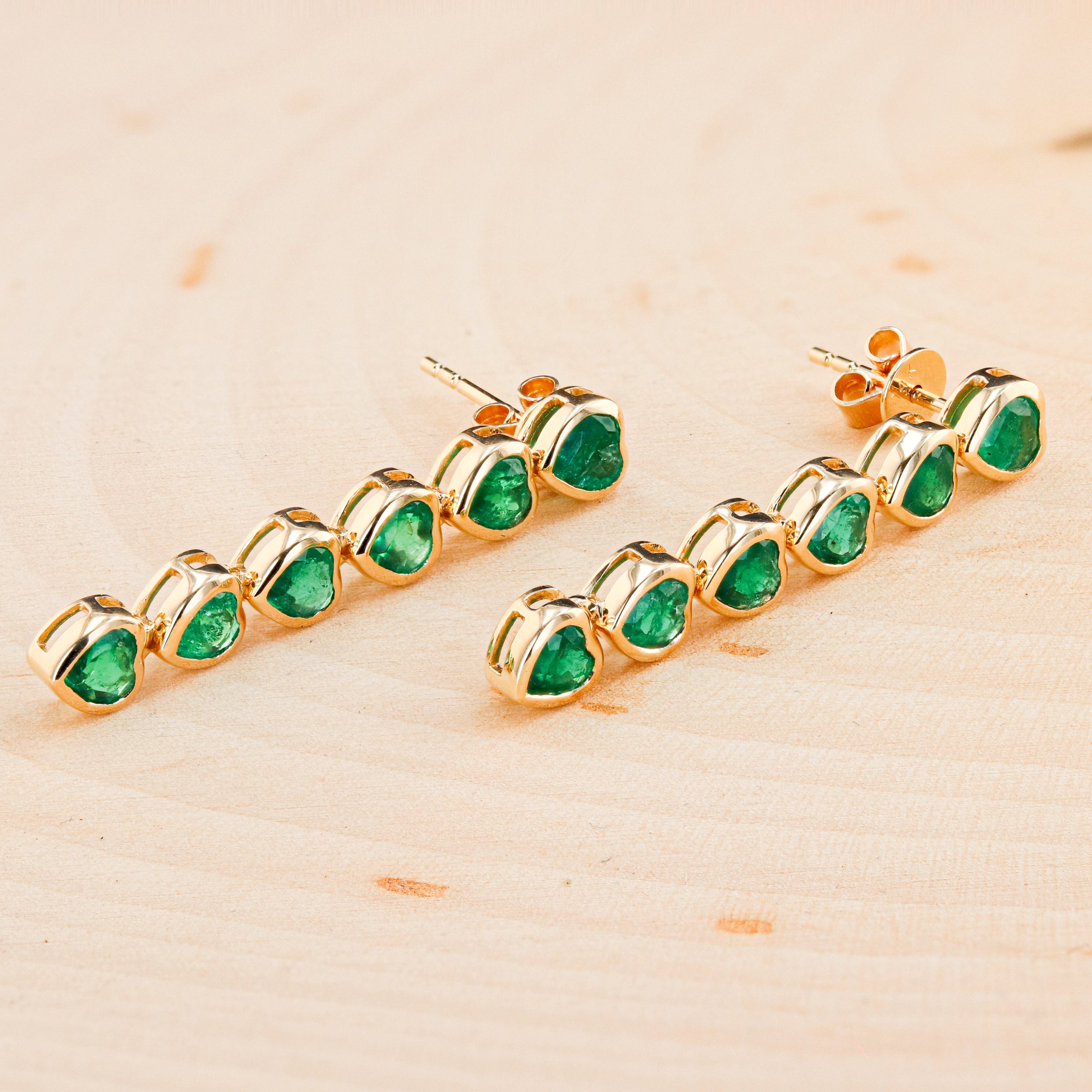 EMERALD HEART DANGLE EARRINGS