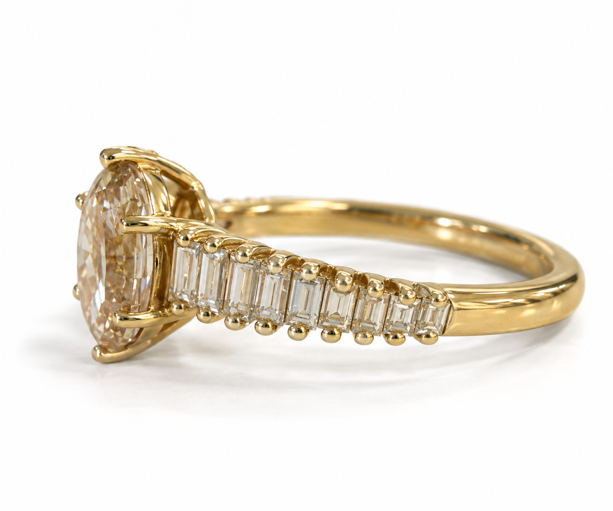 1.50 CARAT STEP CUT OVAL WITH BAGUETTES