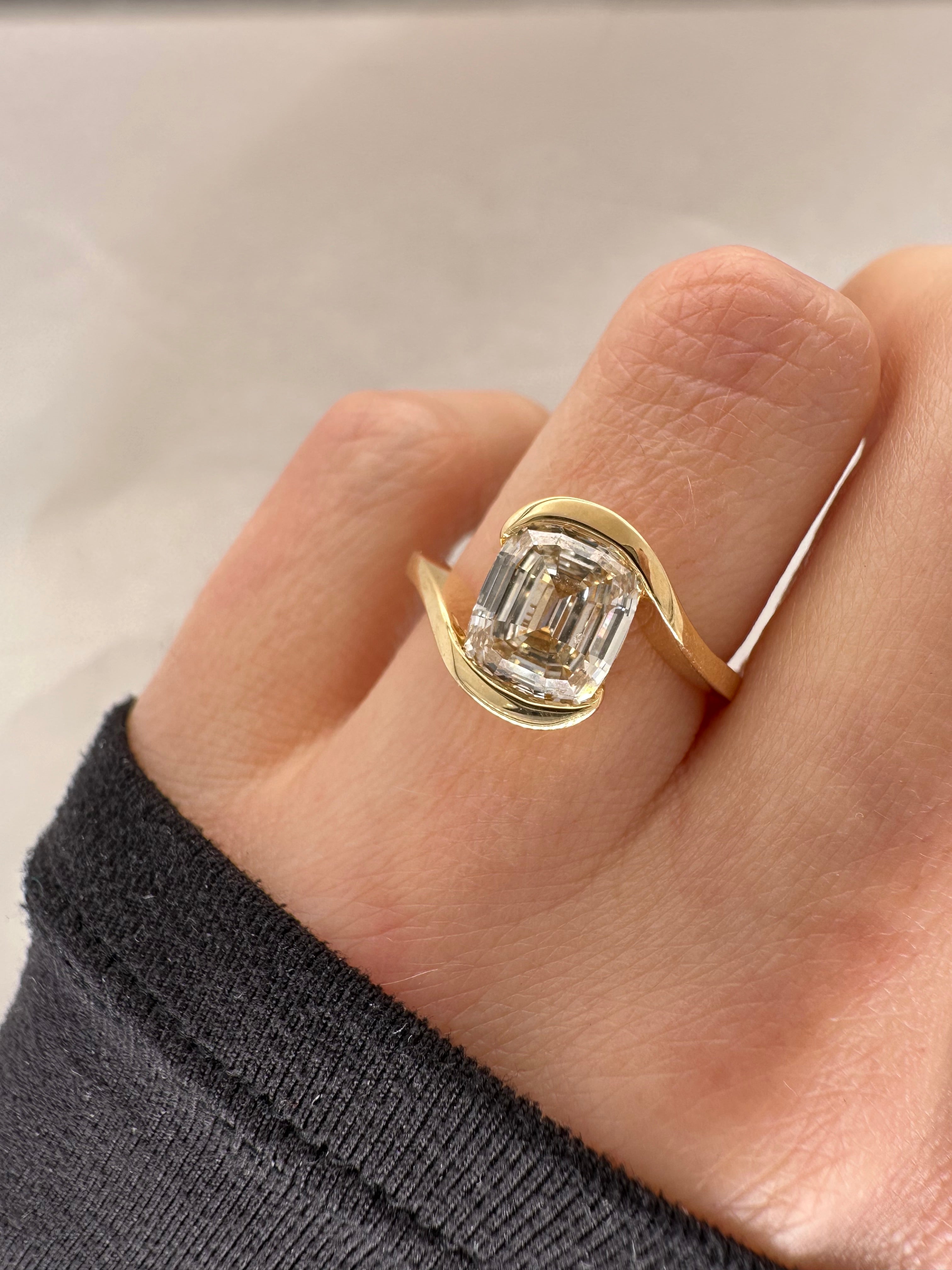 2.34 CARAT STEP CUT CUSHION WAVE WRAP RING