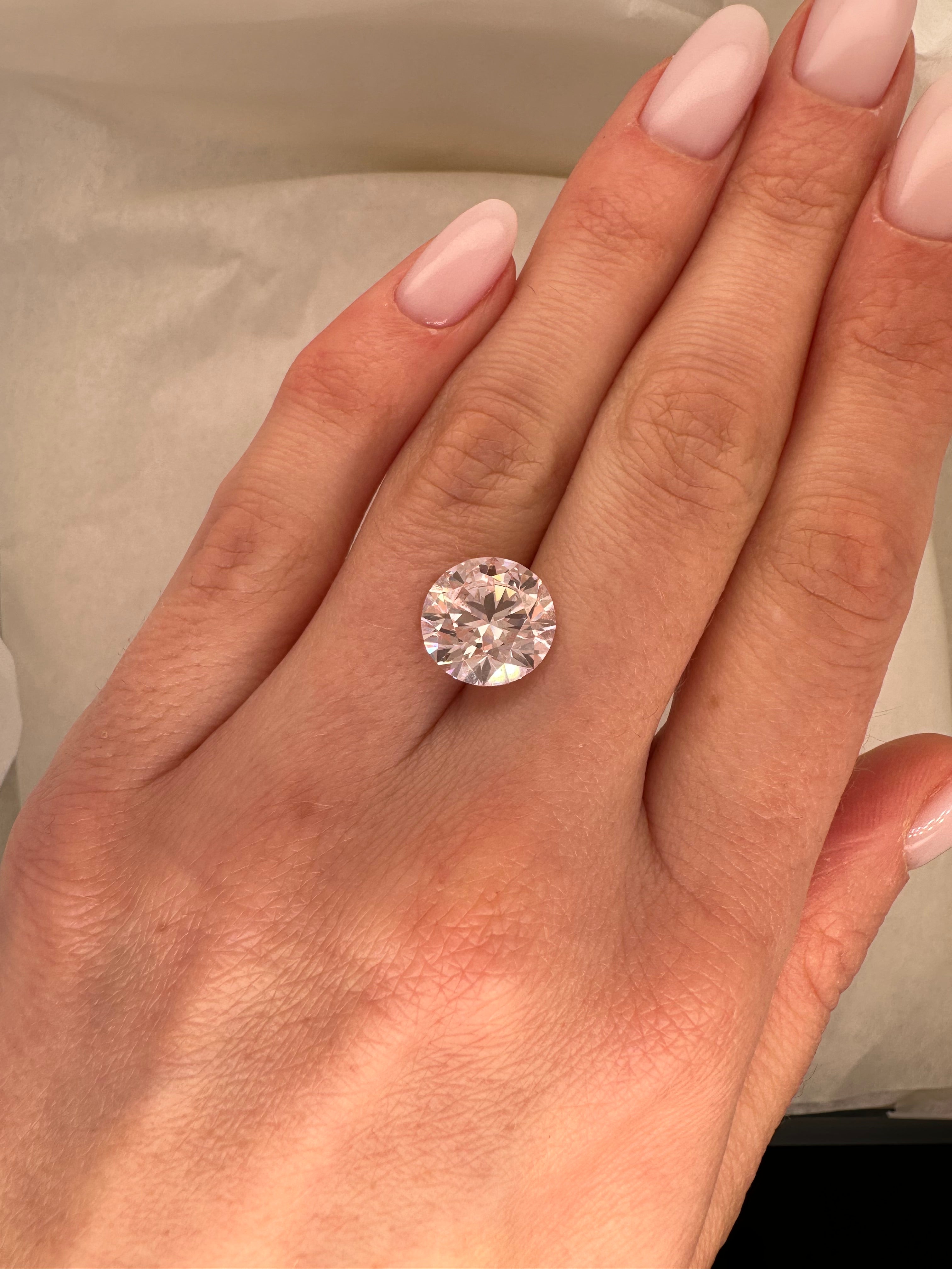 5.03 CARAT FANCY LIGHT PINK ROUND BRILLIANT