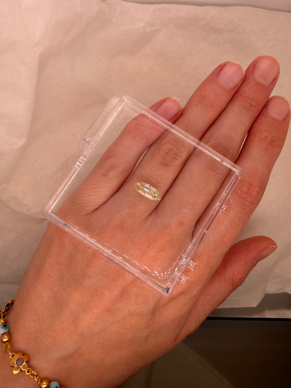 1.09 CARAT BUTTER YELLOW STEP CUT MOVAL