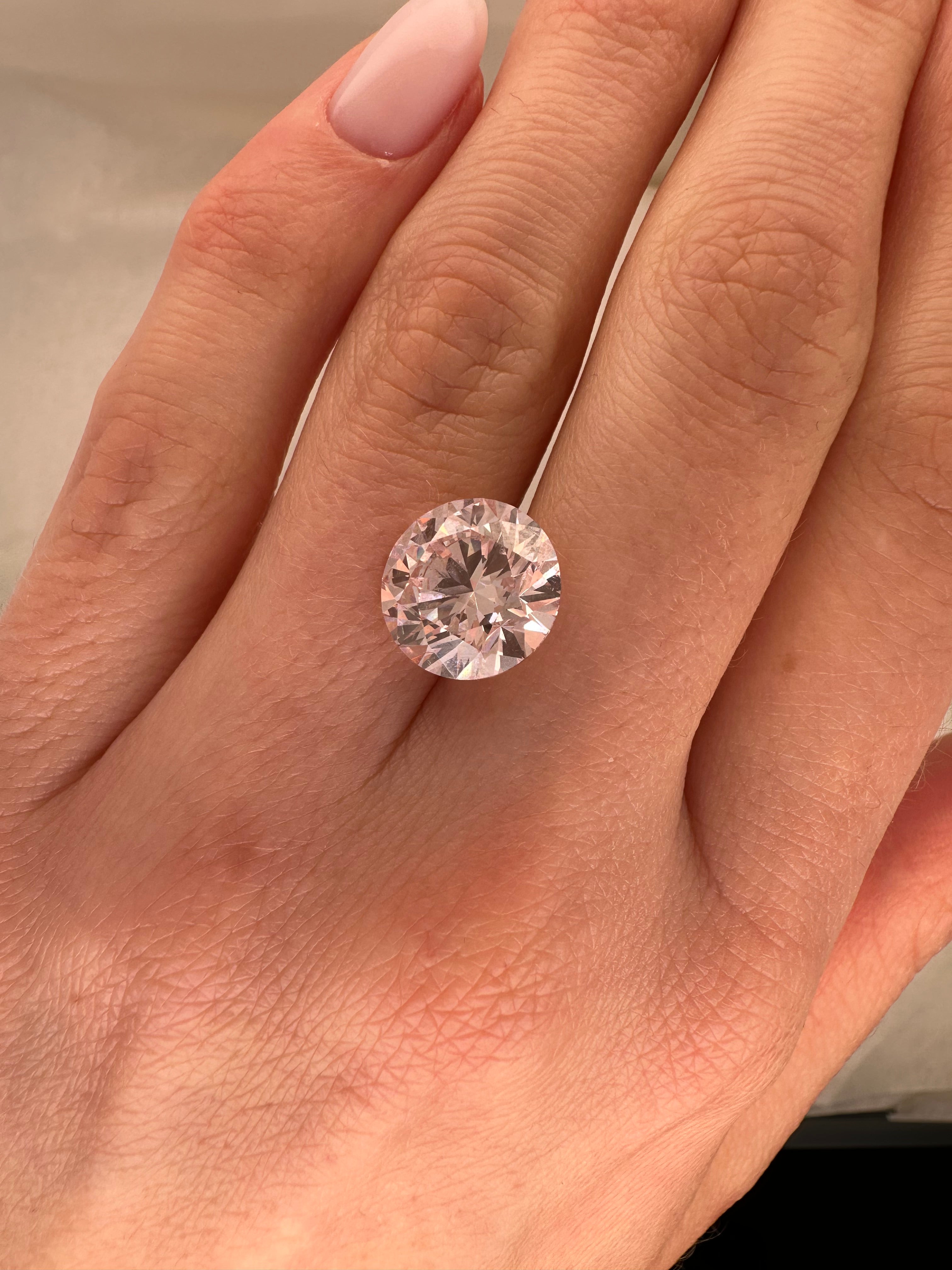 5.03 CARAT FANCY LIGHT PINK ROUND BRILLIANT