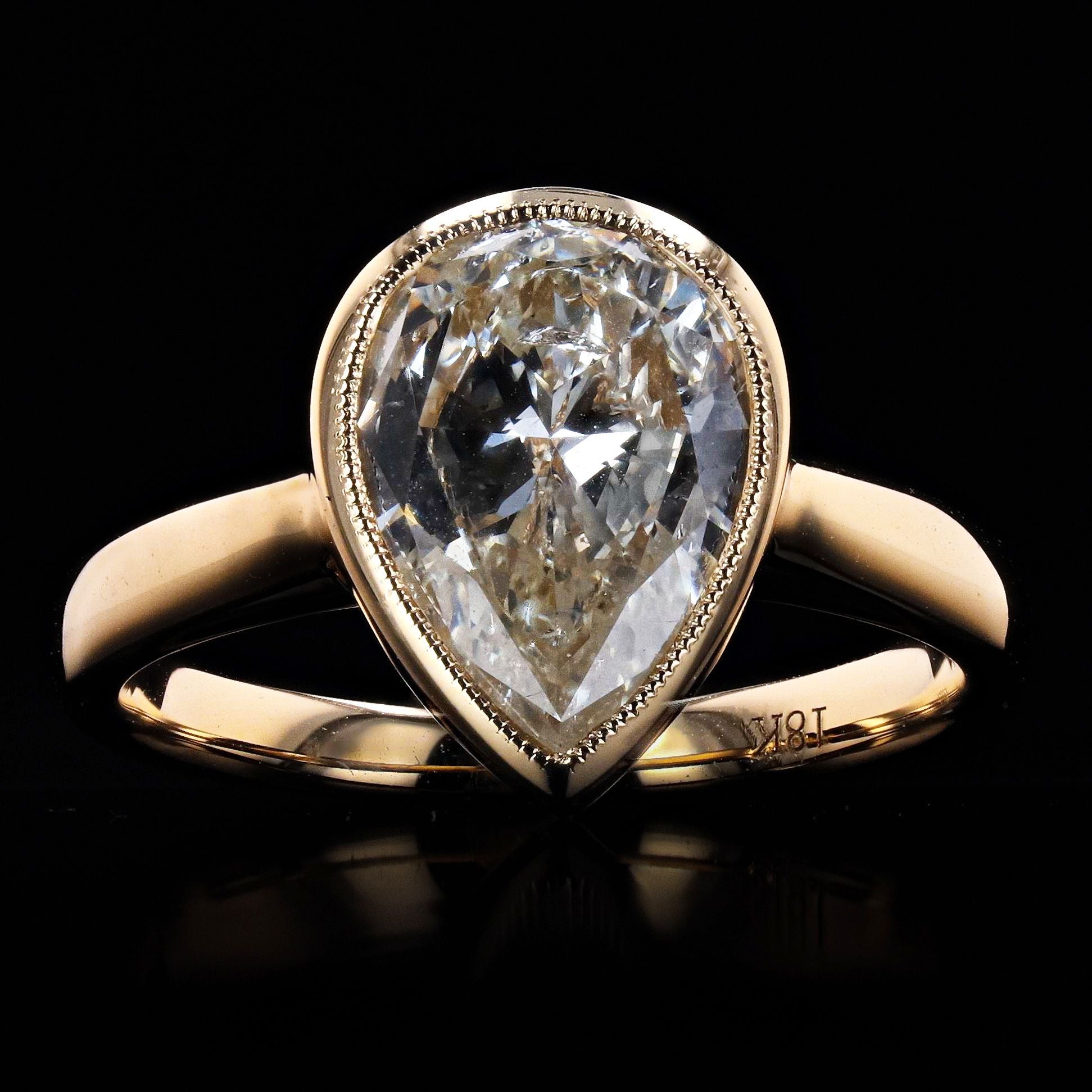 2.02 CARAT PEAR SHAPE DIAMOND BEZEL RING