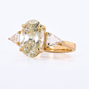 3.23 CARAT CHAMPAGNE OVAL THREE STONE RING