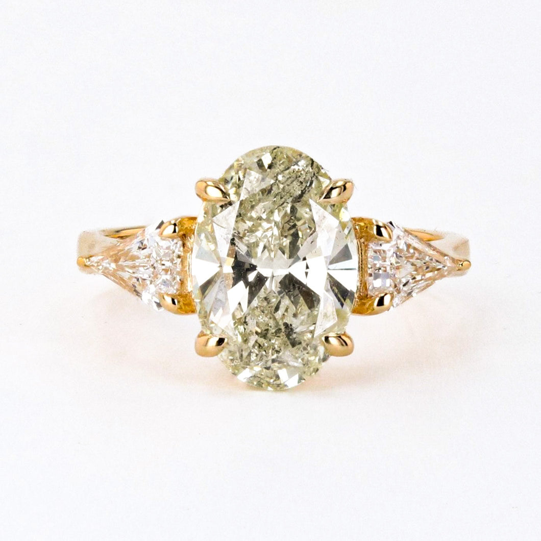 3.23 CARAT CHAMPAGNE OVAL THREE STONE RING